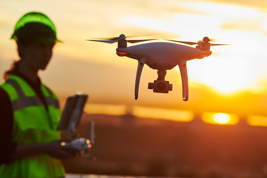 worker flying drone